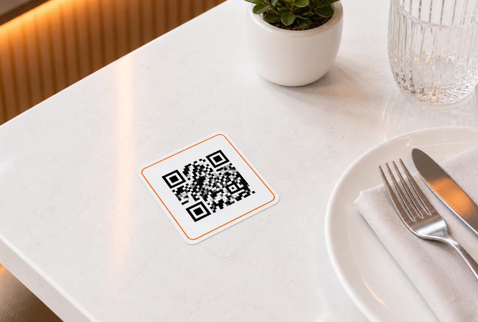 QR code sticker applied directly onto a restaurant table
